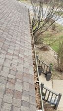 cleaning gutters on second floor